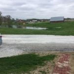 View overlooking lake and barn